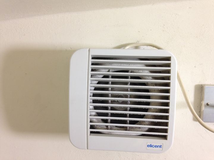 A ceiling exhaust fan grille