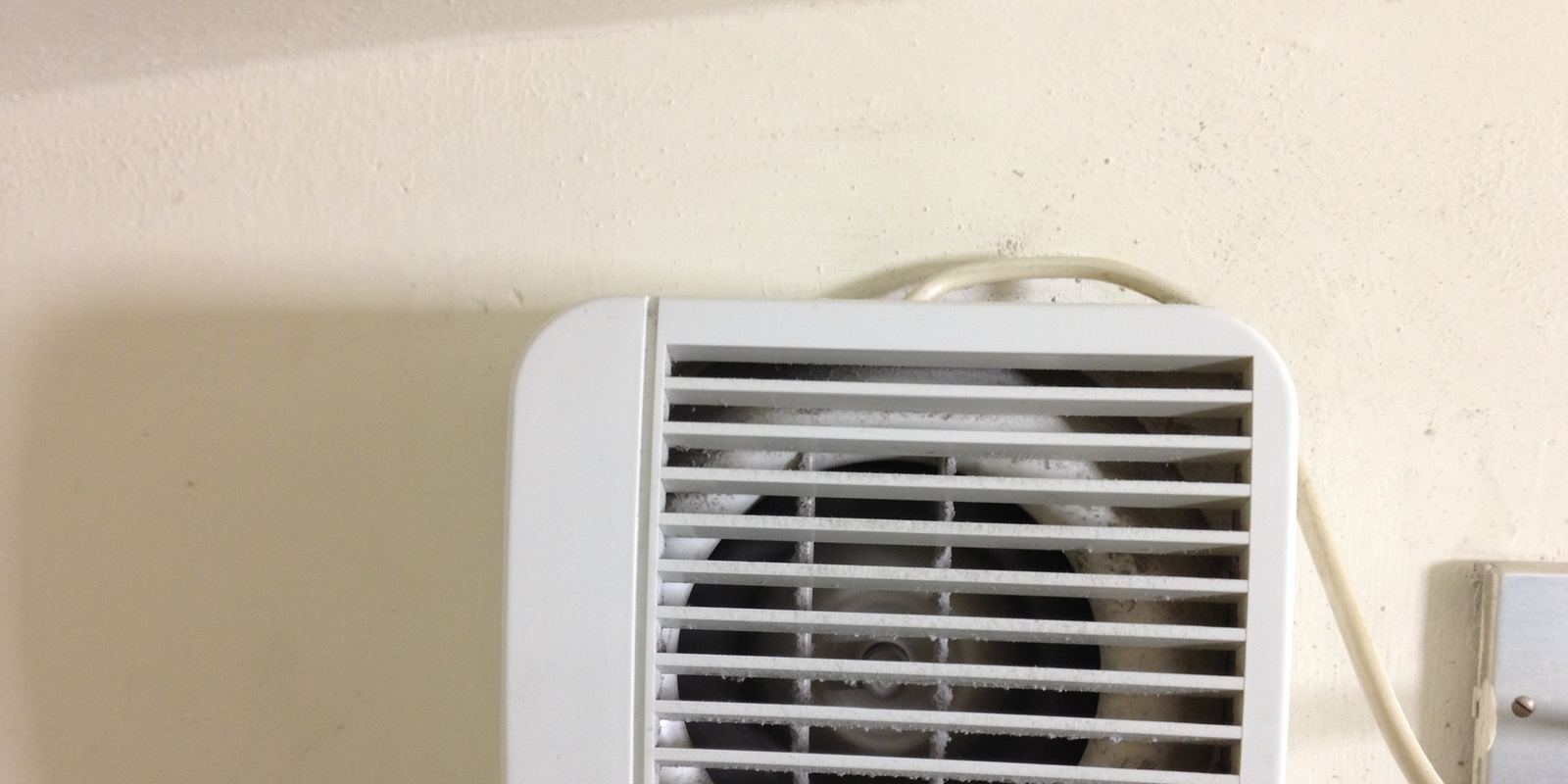 A ceiling exhaust fan grille