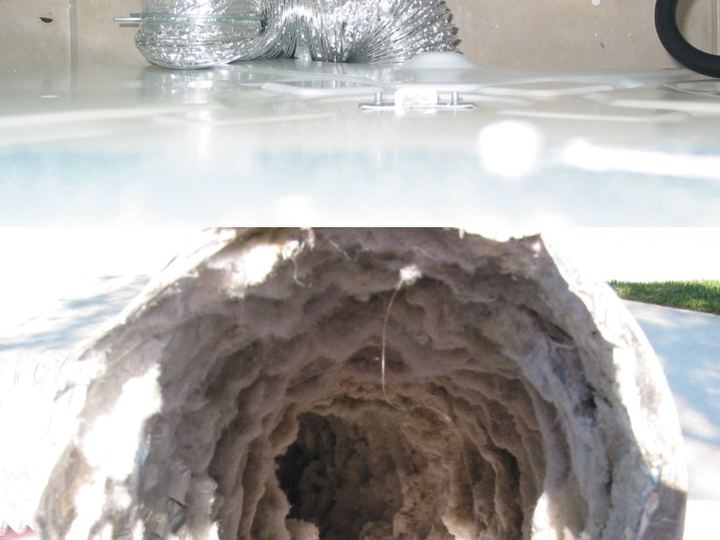 The inside of a clothes dryer flex hose packed with grey lint